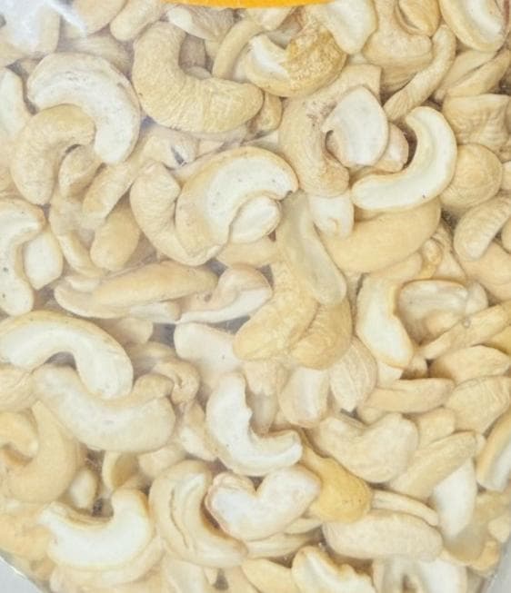 Oven-roasted cashew nut halves in a bowl