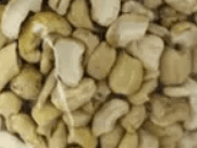 Broken raw cashew nut pieces, unroasted