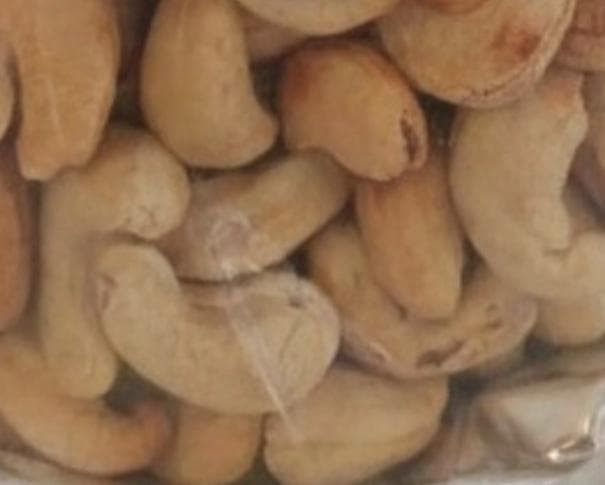 Whole oven-roasted cashew nuts, golden and crunchy