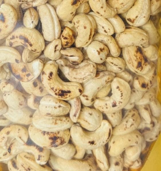 Roasted cashew nuts with skin still on